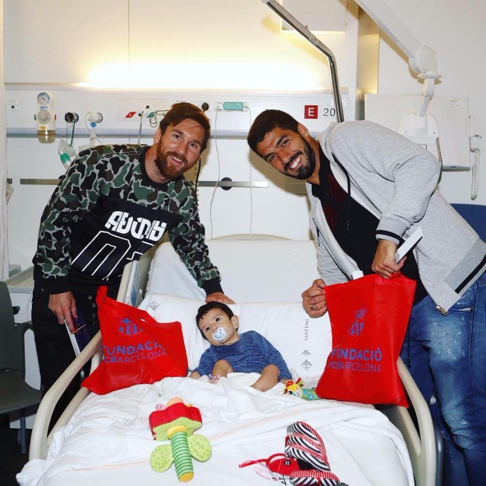  Lionel Messi and Luis Suarez were just two Barca stars to visit a children's hospital
