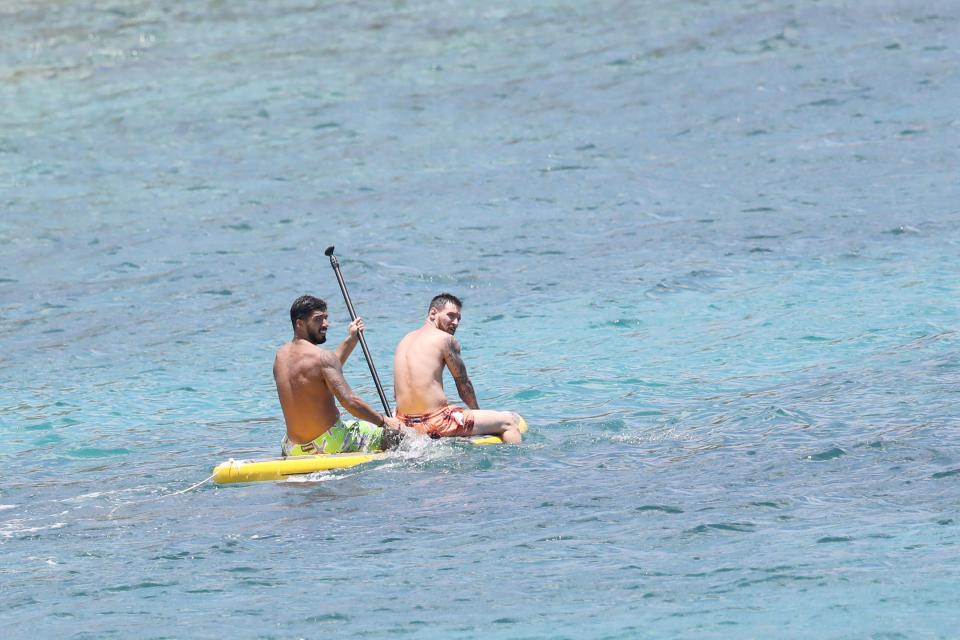  Luis Suarez joined his teammate on the paddeboard
